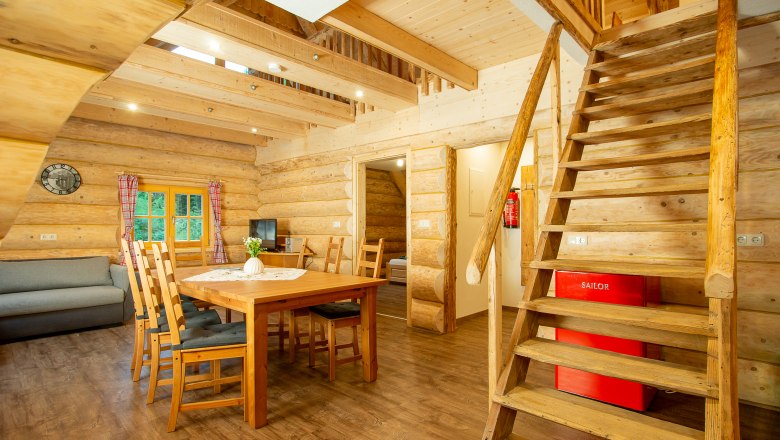 Kitchen-living room with staircase to the sleeping bunk, © Andreas Gruber